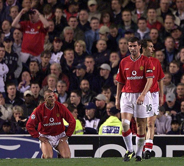 Manchester United's David Beckham, (left) Roy Keane (front right) and Laurent Blanc, look dejected after Deportivo La Coruna's second goal during the UEFA Champions League, Group G match at Old Trafford, Manchester,Wednesday 17th October 2001. PA Photo: Nick Potts.