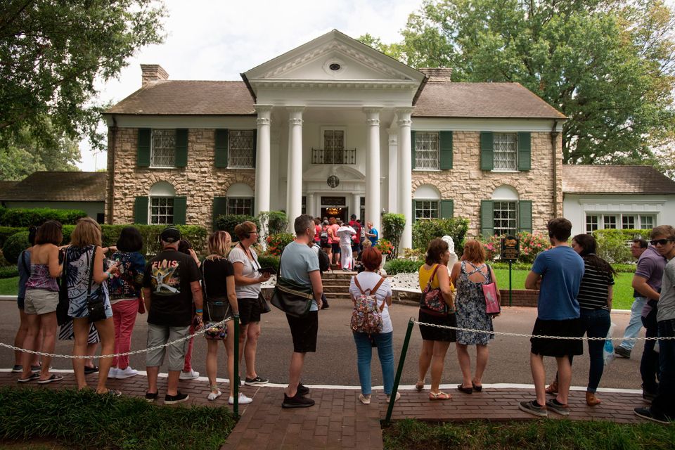 Elvis Presley fans queue outside the King's former home, Graceland, in Memphis, Tennessee. Photo: AP