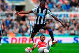thumbnail: Chancel Mbemba of Newcastle United and Francis Coquelin of Arsenal compete for the ball