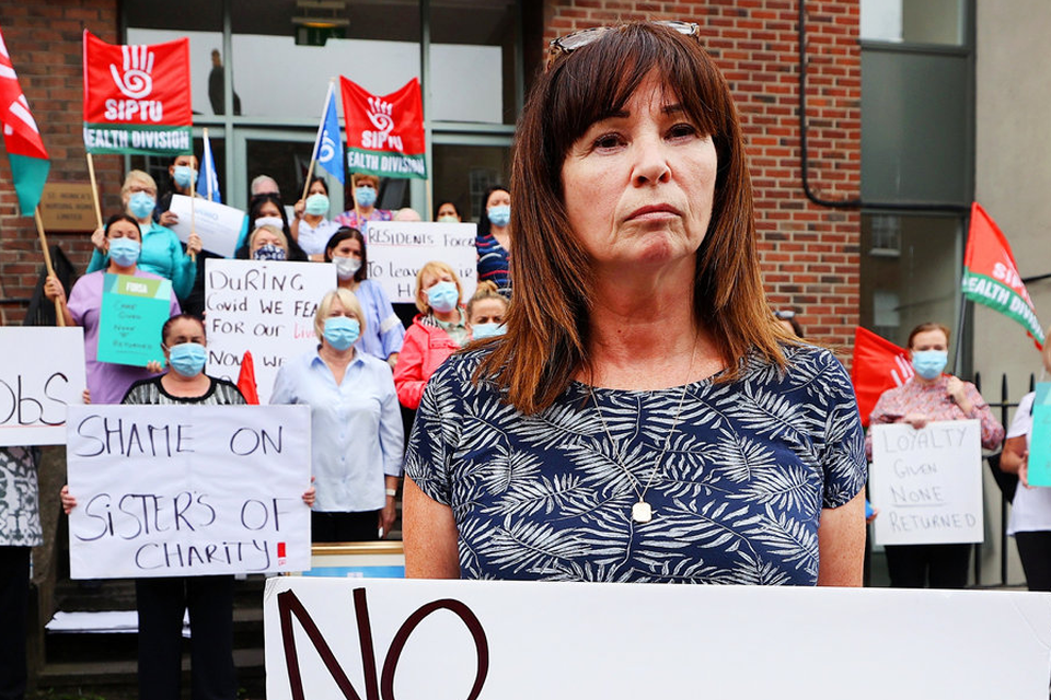Dispute: Healthcare assistant Liz Meade protests alongside fellow staff at St Monica’s Nursing Home in Belvedere Place, Dublin, one of three facilities shutting down with the loss of 180 jobs. Photo: Steve Humphreys
