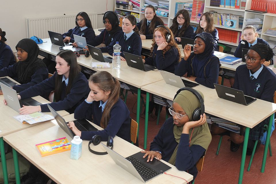 6th class pupils watching The Code Lab step by step video in Castletown Girls' School. Photo: Aidan Dullaghan/Newspics