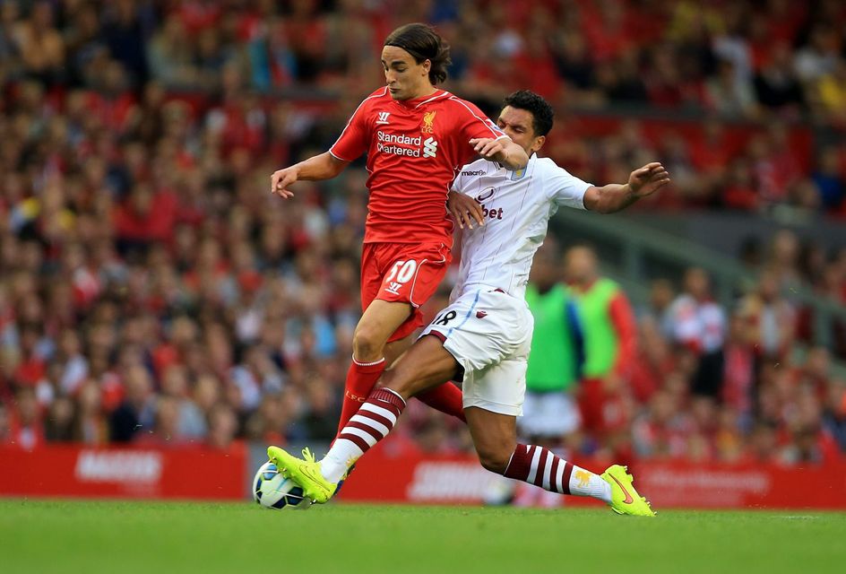 Liverpool's Lazar Markovic and Aston Villa's Kieran Richardson during the Barclays Premier League match at Anfield, Liverpool