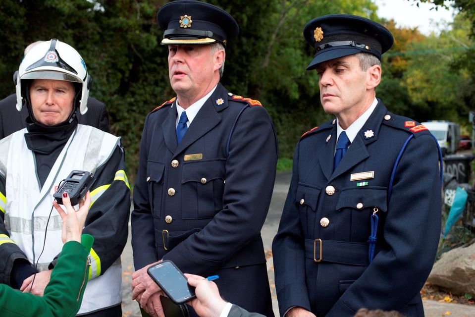 Fire Officer Denis Keely and Garda Superintendent Martin Fitzgerald and Chief Superintendent Diarmuid O'Sullivan at the entrance of the halting site of the tragic fire at Glenmaluck Road, Carrickmines, this morning. Photo: Tony Gavin. 
Photo: Tony Gavin 10/10/2015