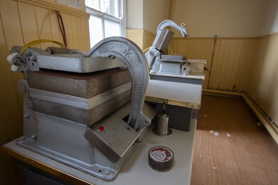 Pressing machines used to make the unleavened wafers for Holy Communion.