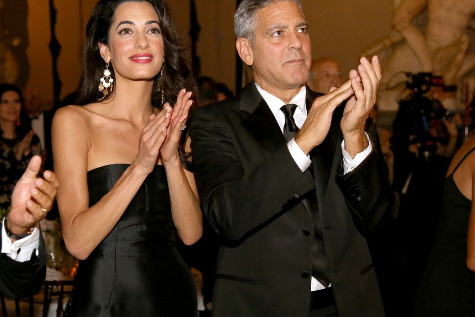 George Clooney (R) and fiance Amal Alamuddin