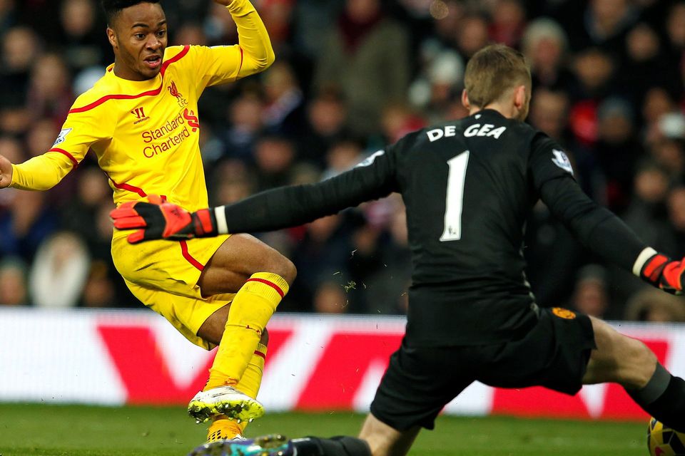 Manchester United goalkeeper David De Gea makes a save from Liverpool's Raheem Sterling at Old Trafford