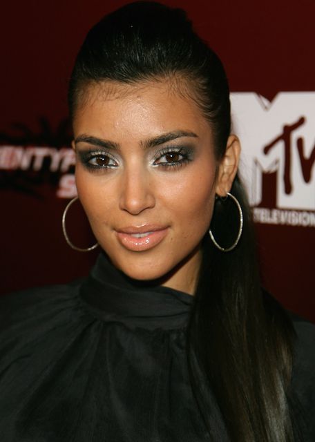 Kim Kardashian's style and looks has become more polished since this 2006 appearance in Los Angeles (Photo by Michael Buckner/Getty Images)