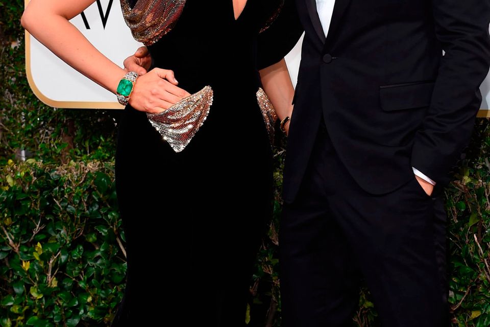 Actress Blake Lively and husband Ryan Reynolds arrive at the 74th annual Golden Globe Award