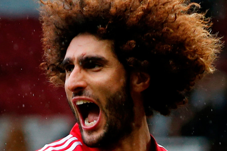 Marouane Fellaini cannot hide his delight after scoring his second goal of the afternoon against Crystal Palace. Photo: Reuters