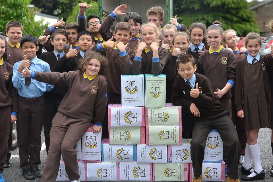 Pupils at St Clare's Primary School Harolds Cross Dublin give the CWUHA convoy the thumbs up.
