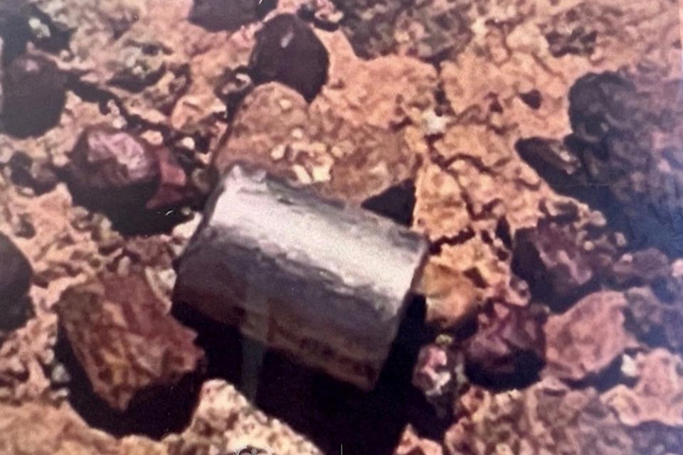 The radioactive capsule lying on the ground, near Newman, Australia. Photo: Western Australian DFES handout via Reuters