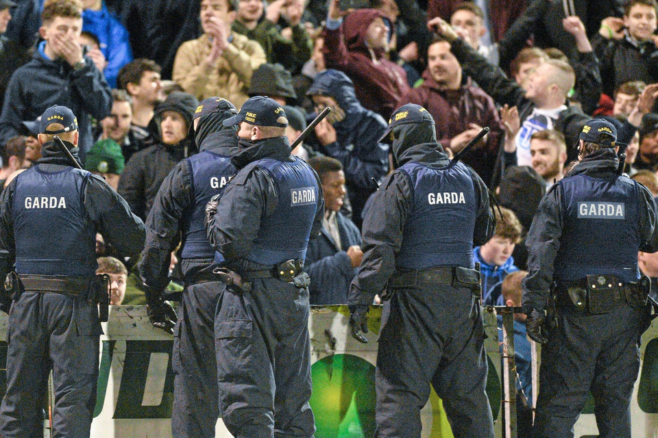 15 April 2016; Members of An Garda Siochana stand in front of Shamrock Rovers supporters. SSE Airtricity League, Premier Division, Bohemians v Shamrock Rovers. Dalymount Park, Dublin. Picture credit: David Maher / SPORTSFILE