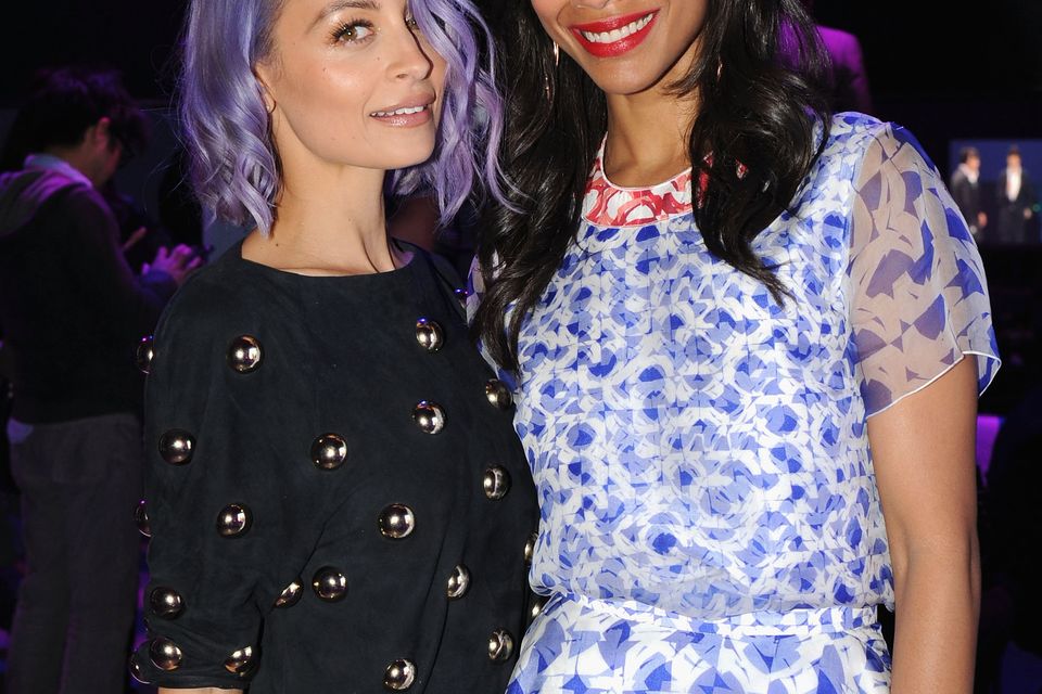 Nicole Richie and Zoe Saldana at the 2014 AOL NewFronts at Duggal Greenhouse on April 29, 2014 in New York, New York.  (Photo by Bryan Bedder/Getty Images for AOL)