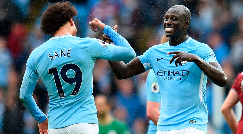 Manchester City's Leroy Sane and Benjamin Mendy celebrate after beating Liverpool 5-0 earlier this season