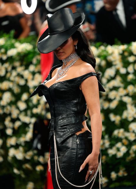 Kim Kardashian poses during the Met Gala, an annual fundraising gala held for the benefit of the Metropolitan Museum of Art's Costume Institute with this year's theme 'Superfine: Tailoring Black Style,' in New York City, New York, U.S., May 5, 2025. REUTERS/Mario Anzuoni