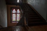 thumbnail: A beautiful stained glass window on the main staircase.