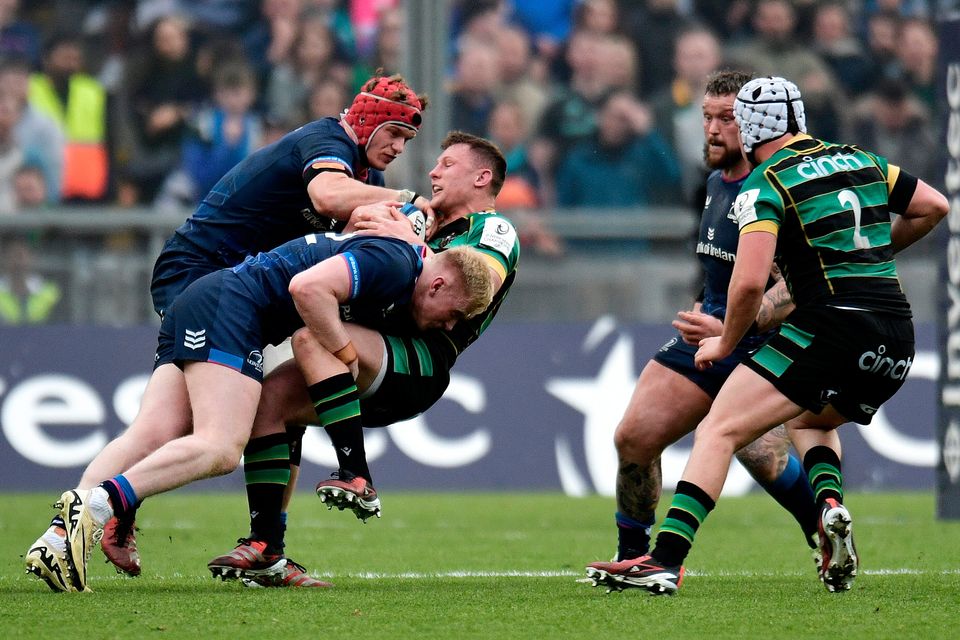 Fraser Dingwall of Northampton Saints is tackled by Leinster's Jamie Osborne and Josh van der Flier in what was a solid defensive display from Leinster until the later stages. Photo: Charles McQuillan/Getty Images