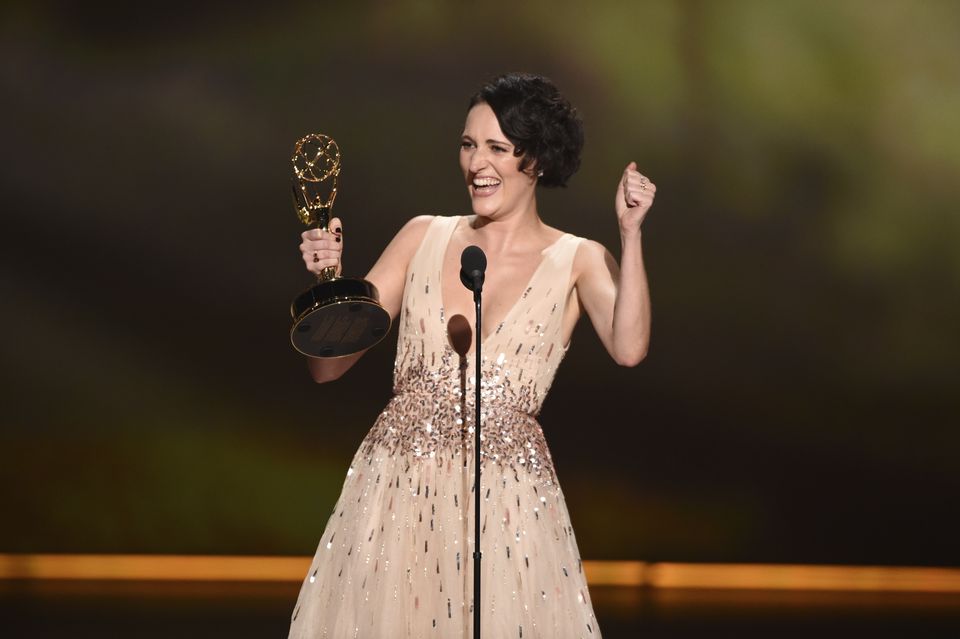 A jubilant Phoebe Waller-Bridge holds an Emmy (Phil McCarten/Invision for the Television Academy/AP Images)