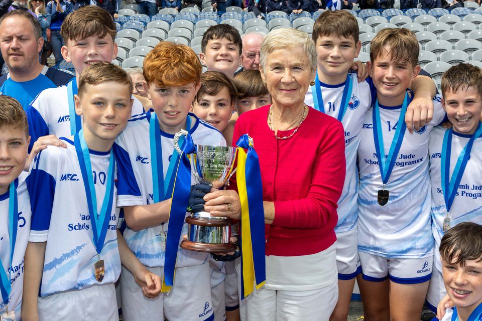 Corn Tom Fitzpatrick: Bishop Galvin NS captain Danny Quigley is presented with the inaugural Corn Tómas Mac Giolla Phádraig by Tom's sister Geraldine.