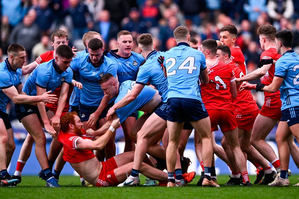 Players from both teams tussle during the Allianz FL Division 1 final at Croke Park. Photo: Ramsey Cardy/Sportsfile