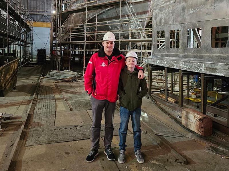 Liam O'Brien of Doolin Ferry, inspecting the new build with son Conor
