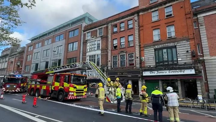 Two people hospitalised after Dublin city centre pub fire; Luas green line operating with delays