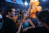thumbnail: Fans of U2 watch them perform onstage on the first night of their 360 tour held at Camp Nou on June 30, 2009 in Barcelona. Photo: Getty Images