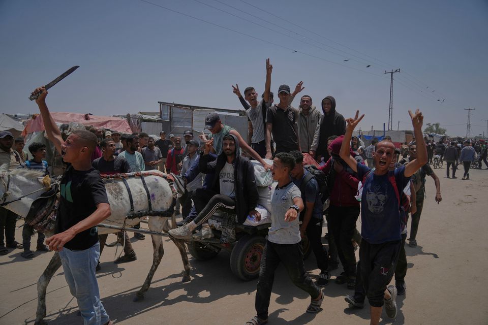 ‘This is a trap, not aid&: At least 12 killed approaching food distribution points in Gaza, officials say