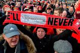 thumbnail: Soccer fans attend a commemoration ceremony on the Manchester place at the Munich Riem airport, southern Germany, Tuesday, Feb. 6, 2018. Sixty years ago on Feb. 6, 1958 a plane with professional players of the Manchester United soccer club on board crashed in Munich with 21 survivors and 23 fatalities. (Matthias Balk/dpa via AP)