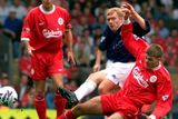 thumbnail: File photo dated 11/9/99 of  Manchester United's Paul Scholes is tackled by Liverpool's Steven Gerrard during  Premiership match at Anfield. PRESS ASSOCIATION Photo. Issue date: Friday May 15, 2015. Steven Gerrard season by season. See PA story SOCCER Season by Season. Photo credit should read PHIL NOBLE/PA Wire.