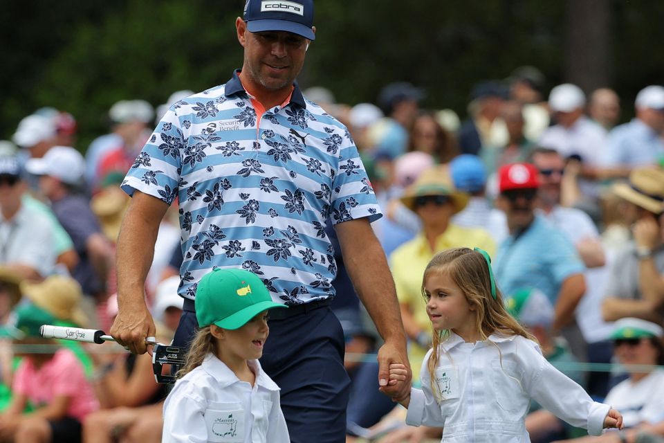 Gary Woodland of the U.S. with daughters Maddox and Lennox