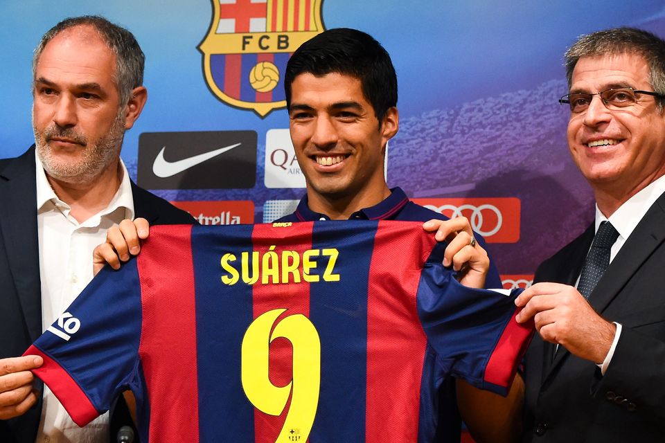 Luis Suarez to Barcelona: 'Suarez 9' shirts go on sale in Spain, The  Independent