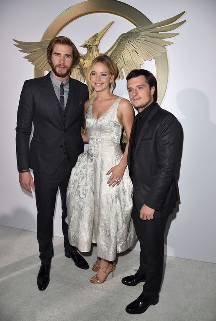 Jennifer Lawrence with her hunger Games co-stars Liam Hemsworth, and Josh Hutcherson