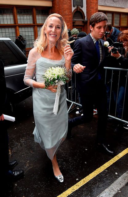 Jerry Hall arrives with James Jagger for her wedding to Rupert Murdoch at St Brides Church, Fleet Street, on March 5, 2016 in London, England.  (Photo by Ben Pruchnie/Getty Images)