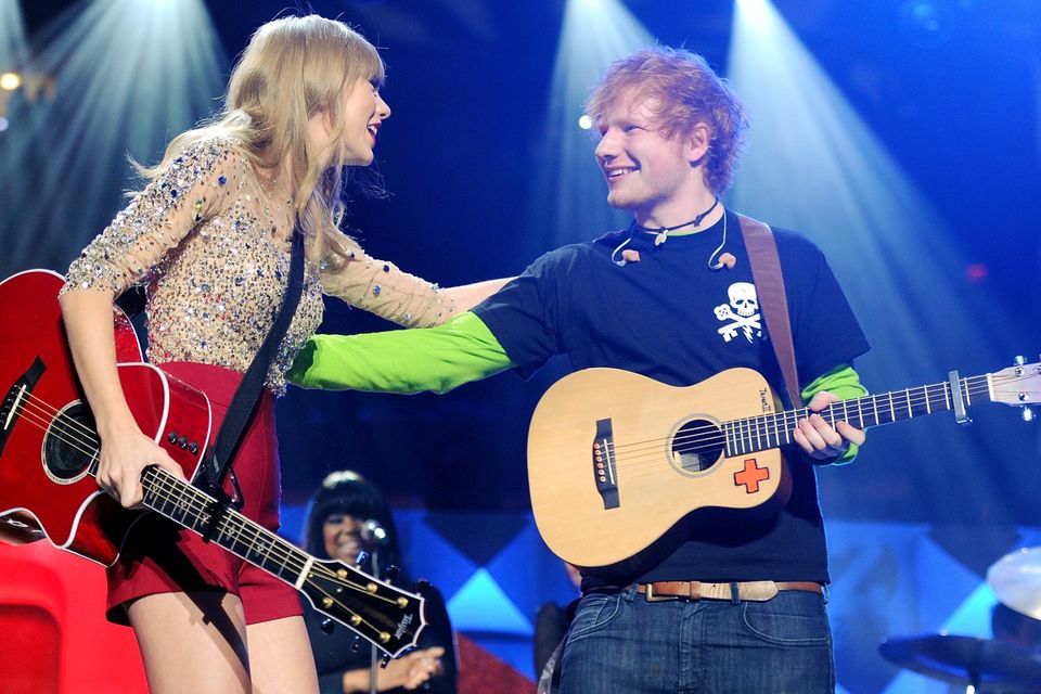 Singers Taylor Swift and Ed Sheeran perform together