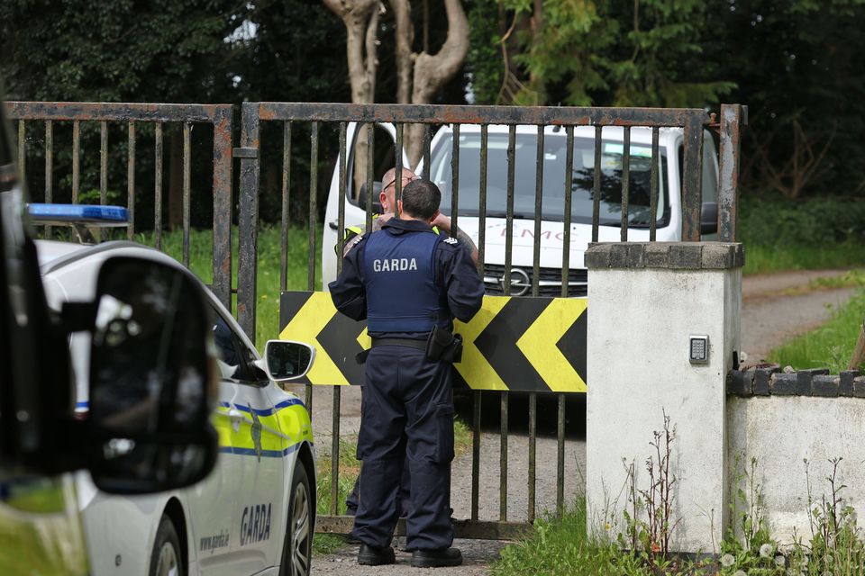 Gardai at the entrance to the Thornton Hall site, which has been earmarked as a possible site to house asylum seekers. Photo: Colin Keegan, Collins Dublin