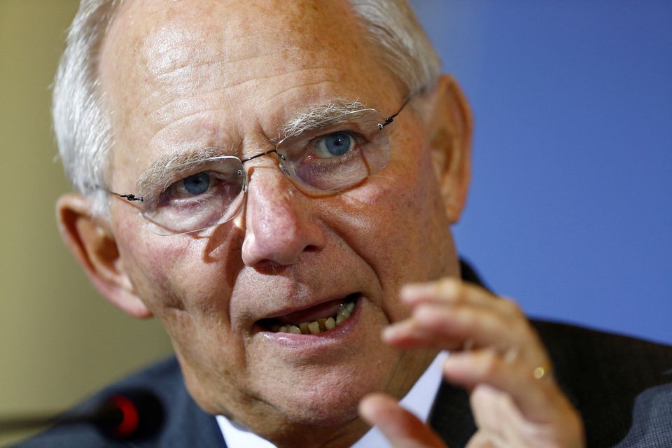 FILE PHOTO: Then-German Finance Minister Wolfgang Schaeuble gestures as he attends a meeting in Berlin, December 2, 2014. The former finance minister has died at age 81.  REUTERS/Hannibal Hanschke/File Photo