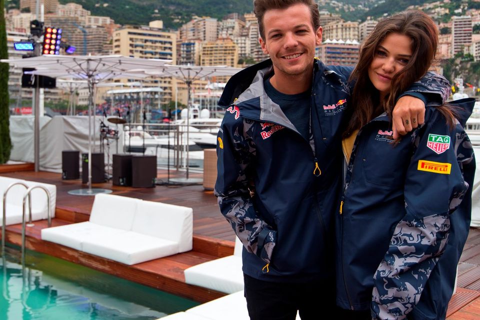 (L-R) Louis Tomlinson and Danielle Campbell attend the Red Bull Racing Energy Station at Monte Carlo on May 29, 2016 in Monaco.  (Photo by Ben A. Pruchnie/Getty Images)
