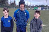 thumbnail: The winners of the North-East hurling skills test with Conor Daly.