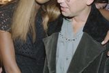 thumbnail: Adam Clayton with Naomi Campbell  during London Fashion Week,1993. (Photo by Dave Benett/Getty Images)