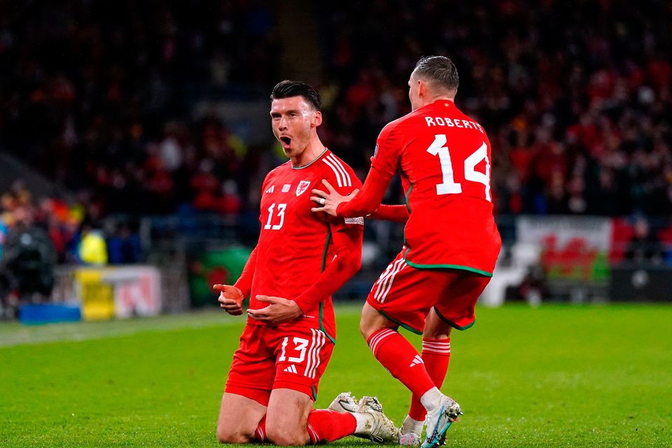 Wales' Kieffer Moore (left) celebrates scoring their side's first goal of the game during the UEFA Euro 2024 qualifying group D match at the Cardiff City Stadium, Cardiff