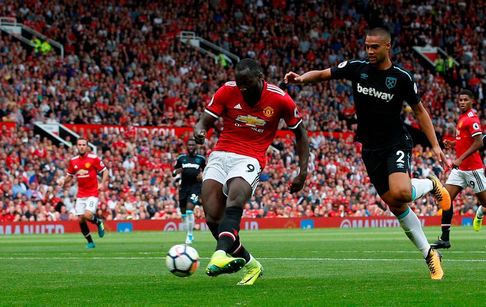 Manchester United's Romelu Lukaku scores their first goal