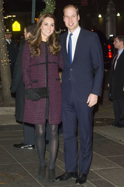 November 2014: She (and husband Pricne William) looks winter ready in a purple Mulberry dress coat.
