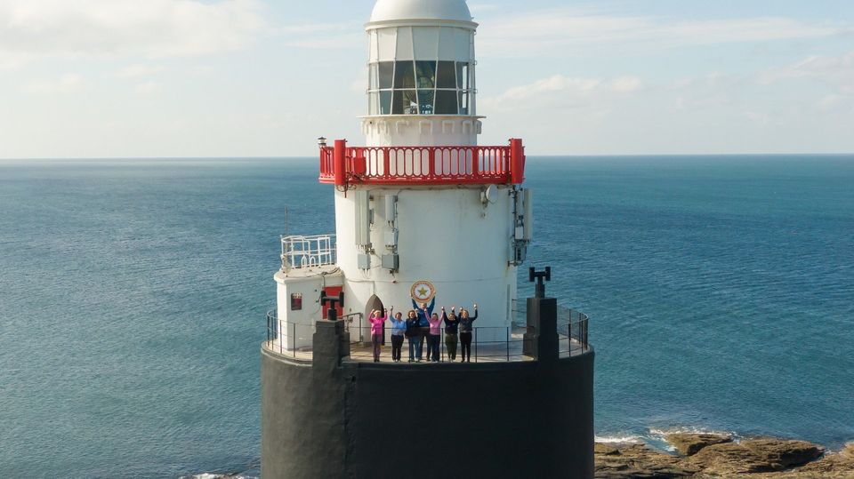 Tom, Laura and the team at the top of Hook Lighthouse.