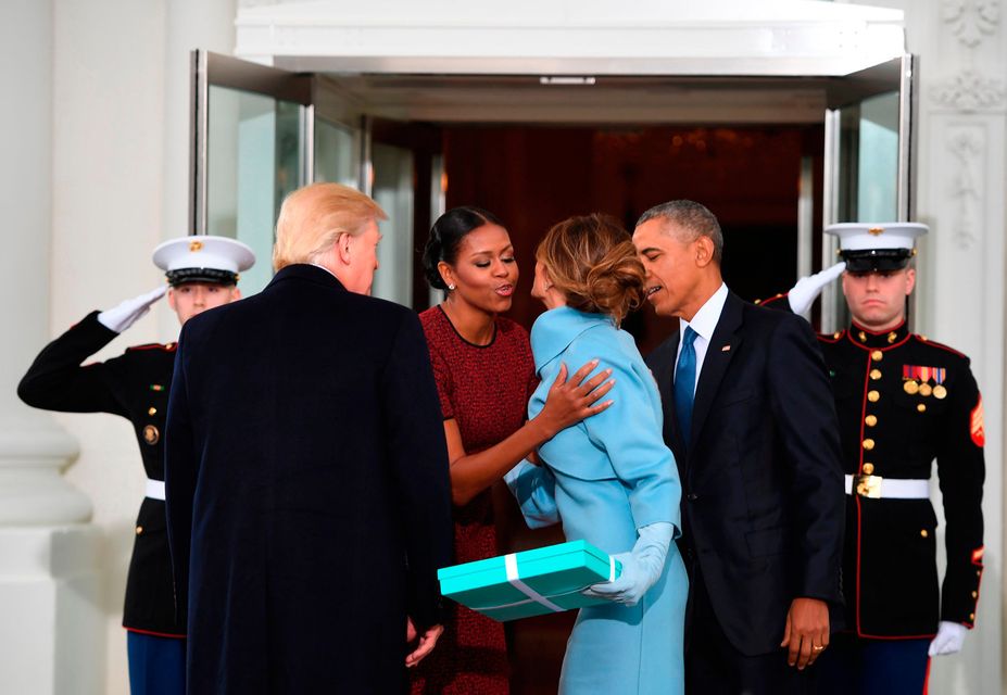 US President Barack Obama(R) and First Lady Michelle Obama(2nd-L) welcome Preisdent-elect Donald Trump(L) and his wife Melania(2nd-R) to the White House