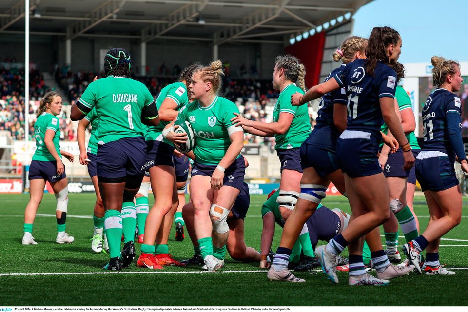 Cliodhna Moloney, centre, celebrates scoring for Ireland during the Women's Six Nations clash against Scotland at the Kingspan Stadium in Belfast. Photo: John Dickson/Sportsfile