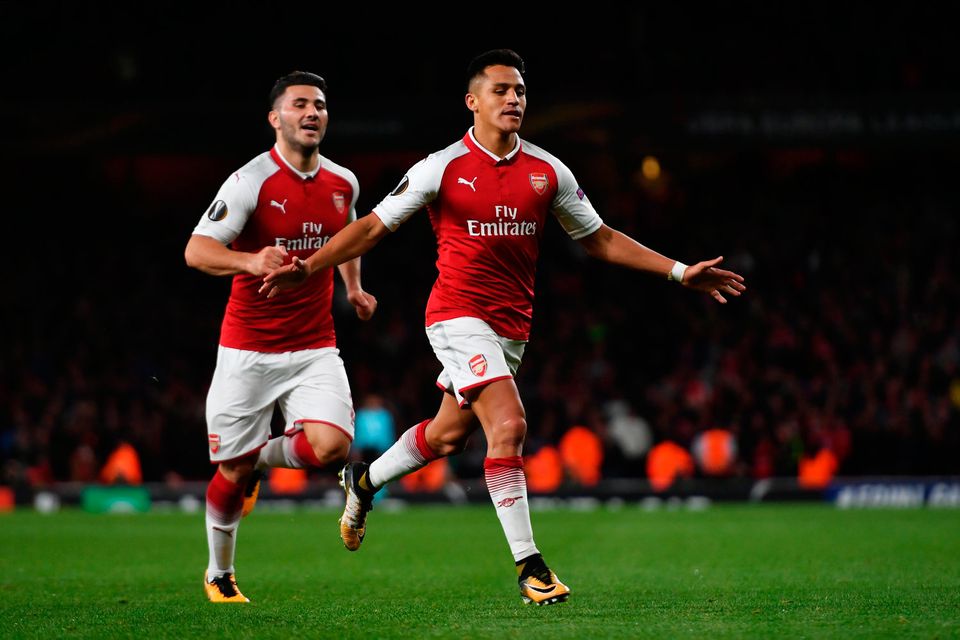 Alexis Sanchez of Arsenal celebrates scoring the 2nd arsenal goal with Sead Kolasinac of Arsenal during the UEFA Europa League group H match between Arsenal FC and 1. FC Koeln at Emirates Stadium.  (Photo by Dan Mullan/Getty Images)