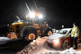 Thumbnail: Wheel loaders are clearing snow, cars and trucks are being recovered, and people are being evacuated in Home Guard tracked vehicles at Ekerozlasten on the E22 between Hoby and Kristianstad in southern Sweden.