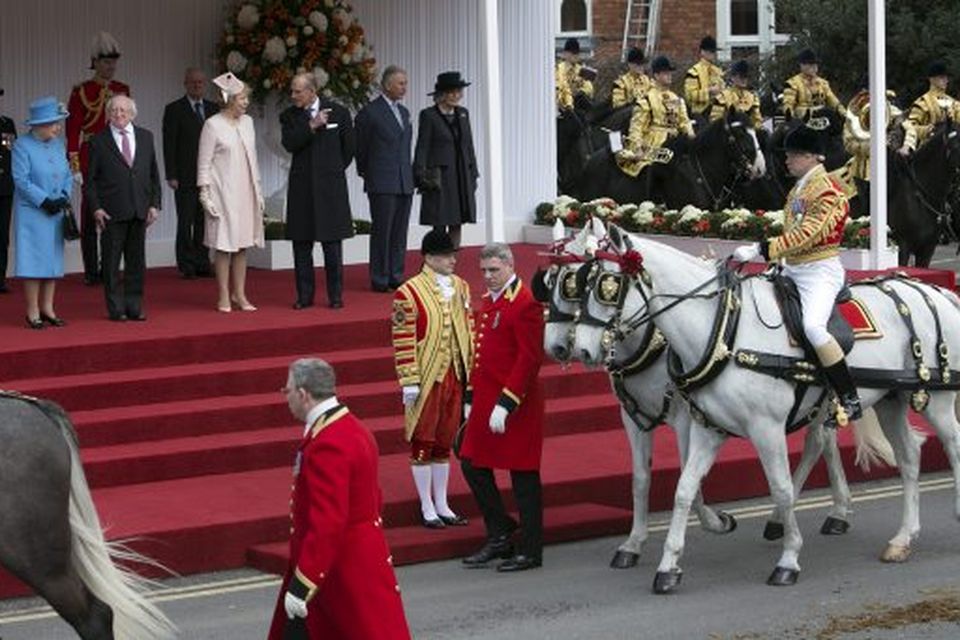 The royal carriage arrives outside Windsor Castle during the state visit of President Higgins to Britain