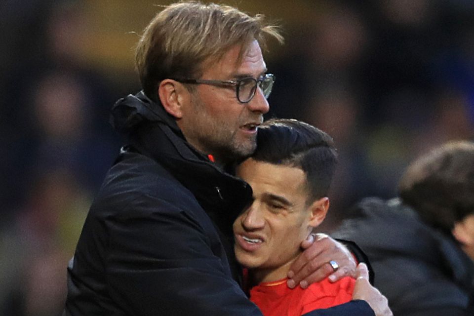 Philippe Coutinho, pictured right, with Jurgen Klopp